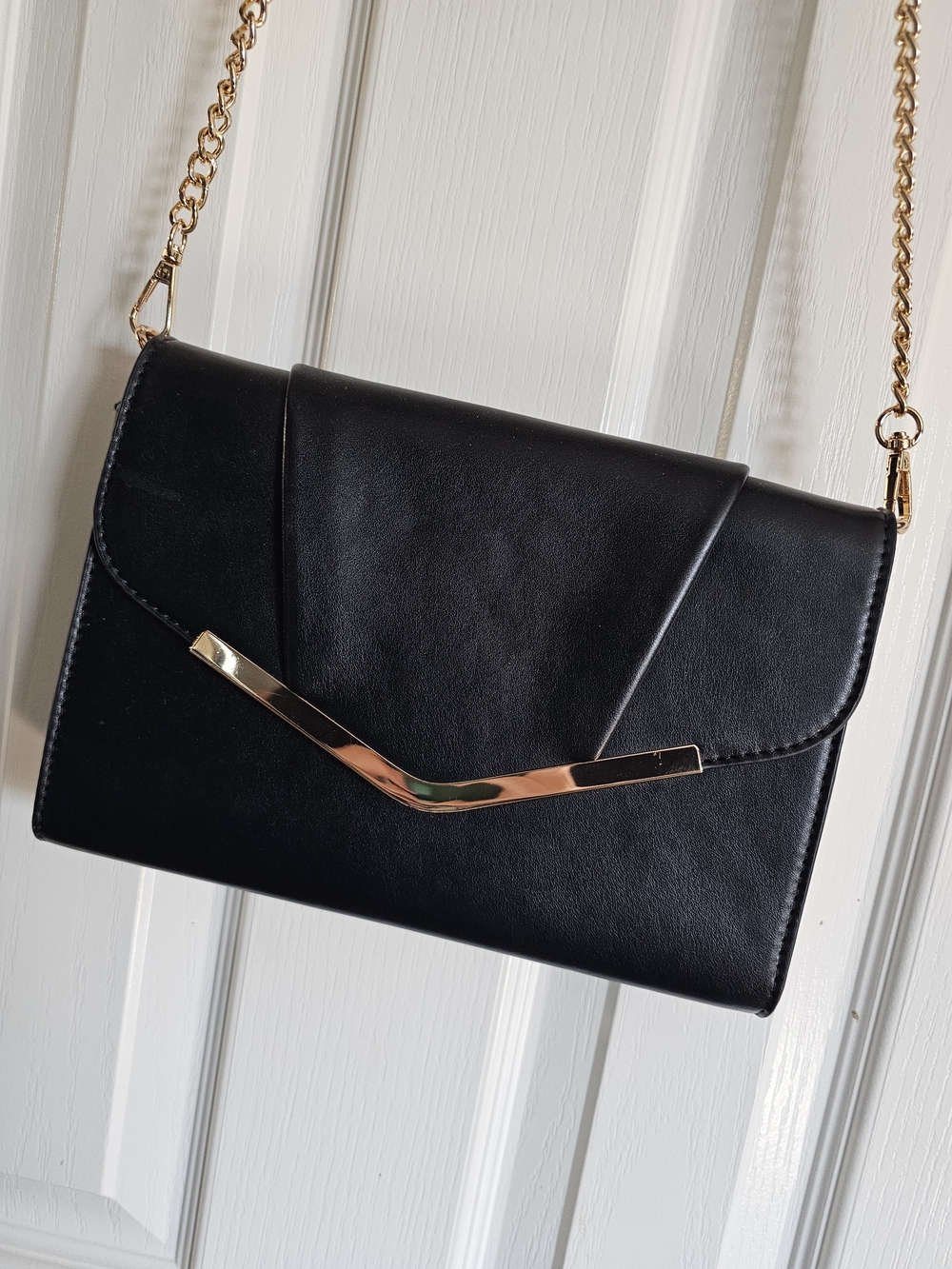 Classic Black Envelope Crossbody Bag with Gold Accent